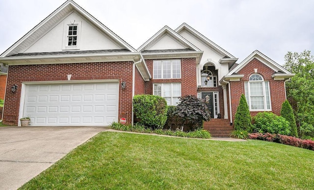 1967 Weston Hills Dr NW, Cleveland, TN 37312 - view of front of property featuring brick siding, concrete driveway, a front lawn, stucco siding, and a garage
