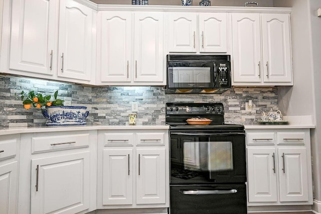 1967 Weston Hills Dr NW, Cleveland, TN 37312 - kitchen with black appliances, white cabinets, tasteful backsplash, and light countertops