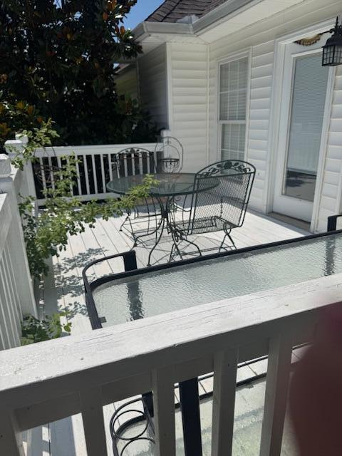 1967 Weston Hills Dr NW, Cleveland, TN 37312 - wooden deck with outdoor dining area
