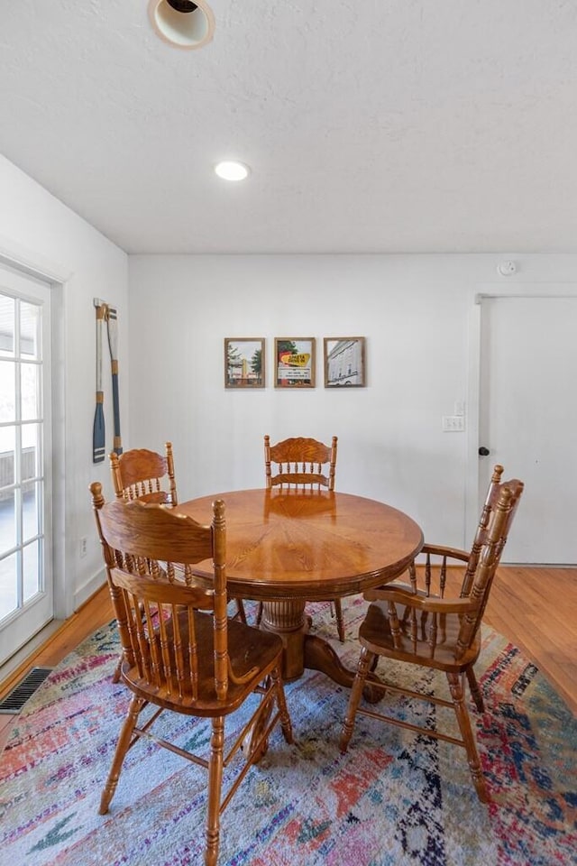 5027 Fanchers Mill Rd, Sparta, TN 38583 - dining room featuring light wood-style floors, baseboards, and recessed lighting