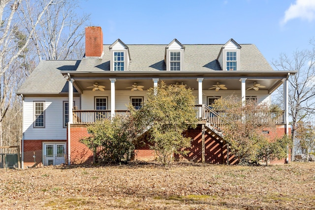 rear view of house with a porch and ceiling fan