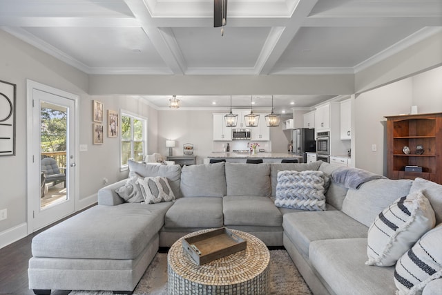 living room with beamed ceiling, dark wood-type flooring, coffered ceiling, and ornamental molding