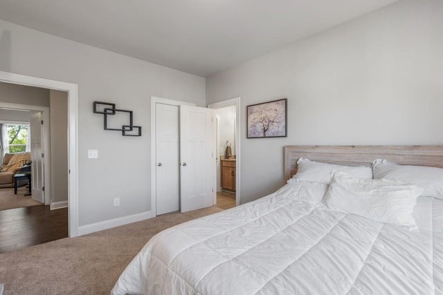 bedroom featuring light carpet