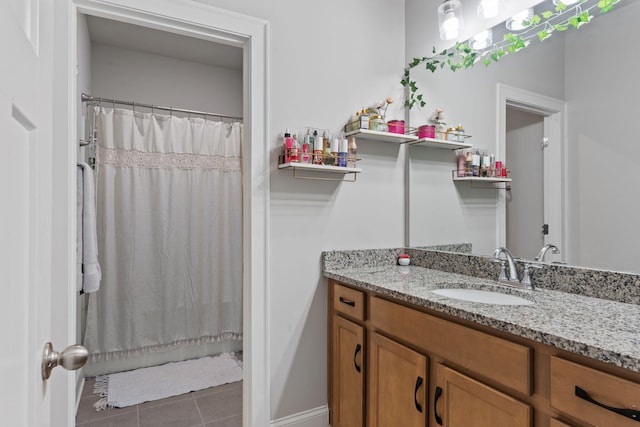 bathroom with tile patterned flooring, vanity, and shower / tub combo with curtain