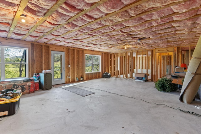 misc room featuring a healthy amount of sunlight and concrete floors