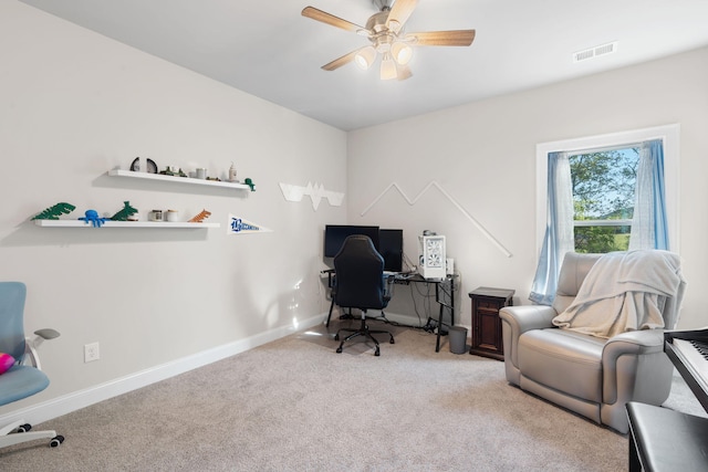 office with ceiling fan and light colored carpet