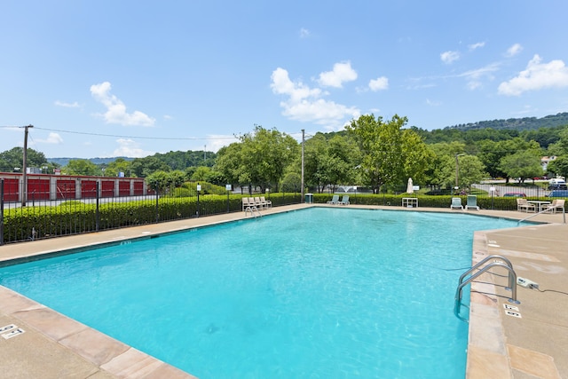 view of pool featuring a patio area