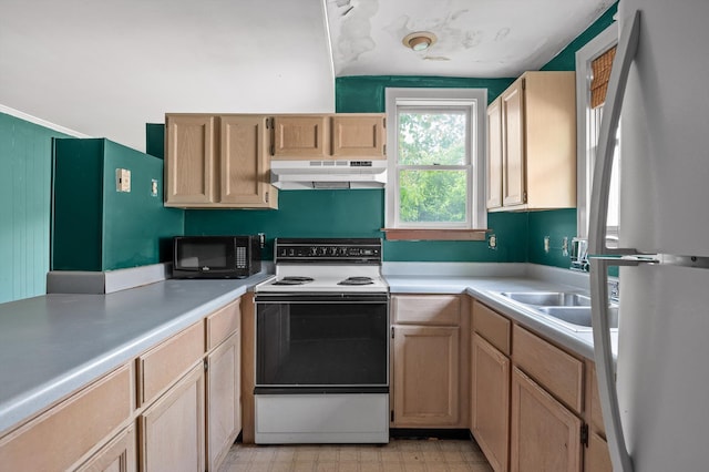 kitchen featuring freestanding refrigerator, under cabinet range hood, electric range oven, black microwave, and light countertops