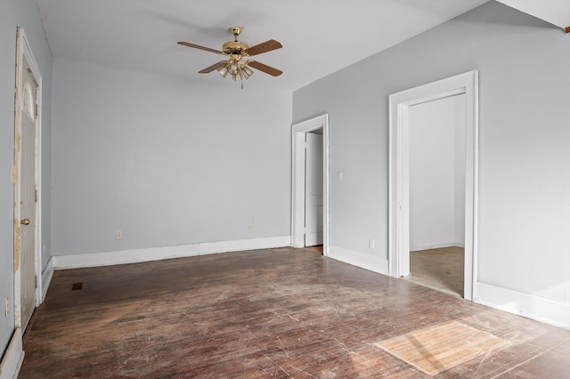unfurnished bedroom with baseboards, ceiling fan, and wood finished floors