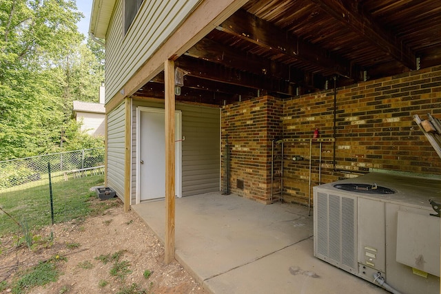 view of patio / terrace featuring fence
