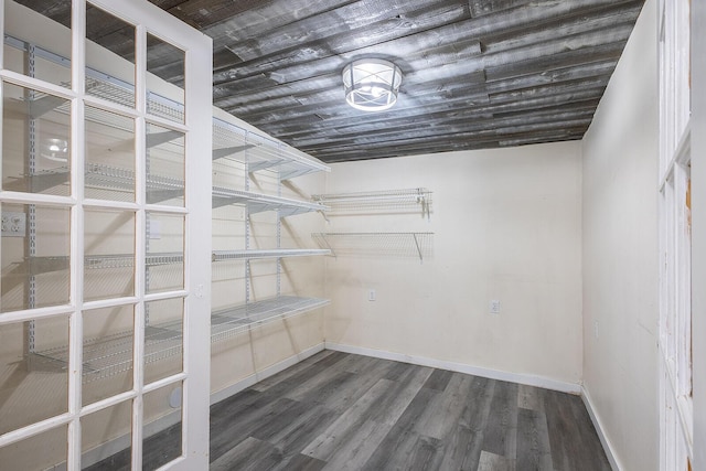 spacious closet with wood finished floors
