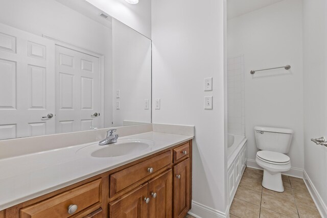 7510 Noah Reid Rd, Chattanooga, TN 37416 - full bathroom featuring toilet, baseboards, tile patterned floors, and vanity