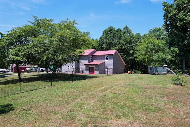 view of yard with a storage shed