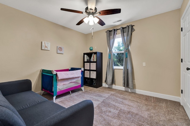 carpeted bedroom featuring ceiling fan