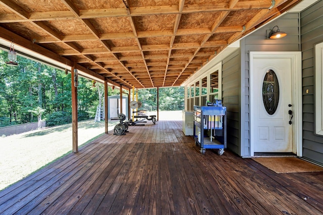 deck featuring a storage shed