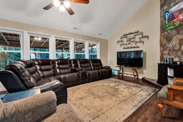 living room with ceiling fan, hardwood / wood-style floors, and lofted ceiling