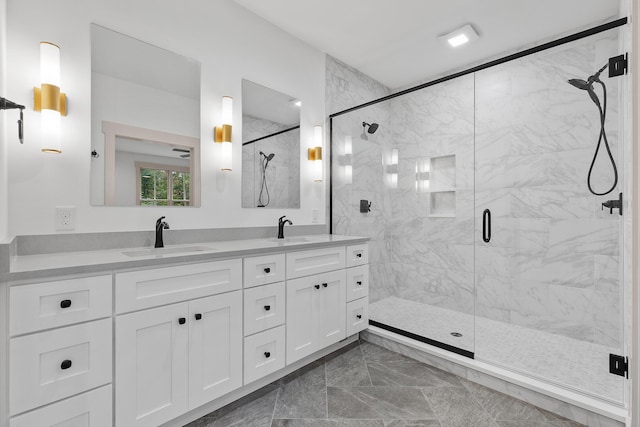 bathroom with vanity and walk in shower