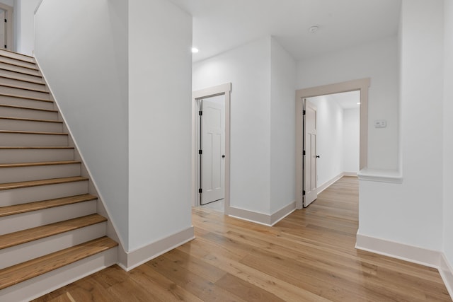 stairway with wood-type flooring