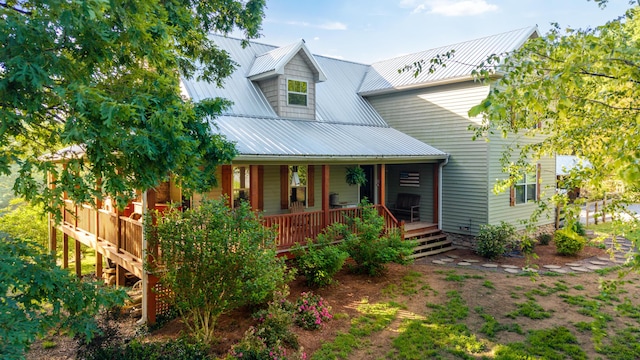 310 Moore Circle Rd, Charleston, TN 37310 - view of front facade featuring a porch and metal roof