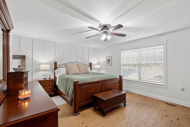 310 Moore Circle Rd, Charleston, TN 37310 - bedroom featuring light wood-style floors, baseboards, and ceiling fan