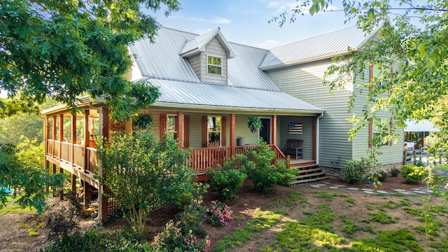 310 Moore Circle Rd, Charleston, TN 37310 - view of front of house featuring covered porch and metal roof