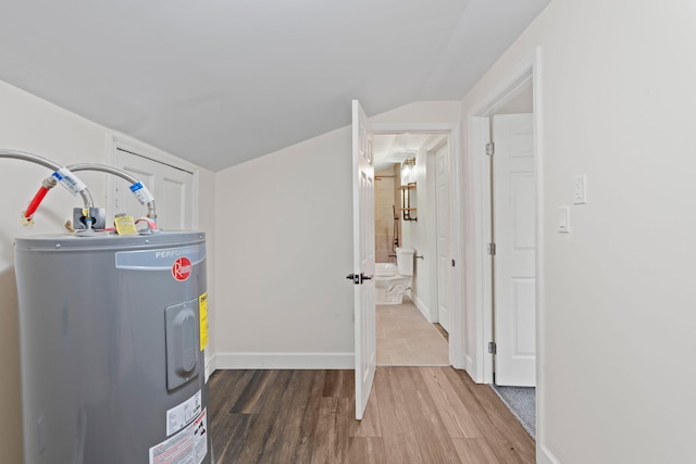 utility room featuring electric water heater