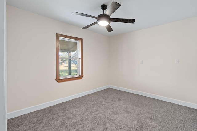 empty room with carpet flooring and ceiling fan