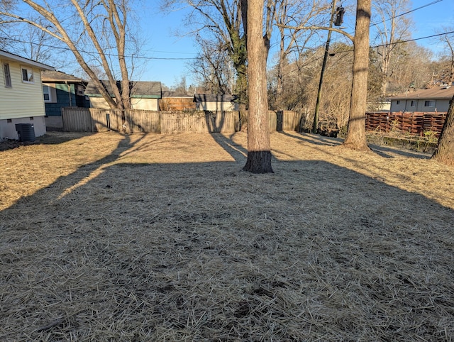 view of yard with central air condition unit