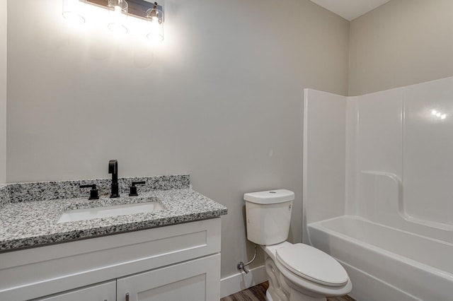 full bathroom featuring shower / bathtub combination, vanity, toilet, and wood-type flooring