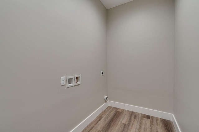 laundry area with hardwood / wood-style flooring, washer hookup, and hookup for an electric dryer