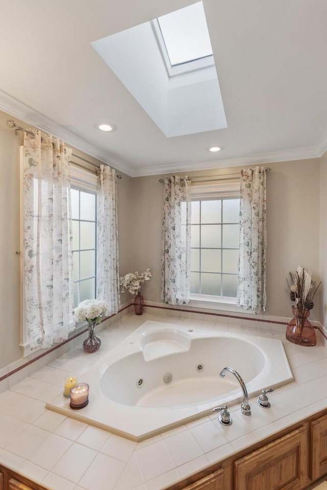 bathroom featuring tiled tub, crown molding, and a skylight