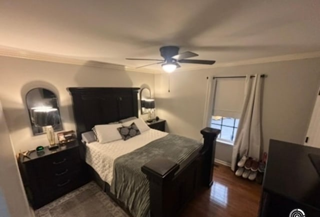 bedroom with dark wood-style flooring, a ceiling fan, ornamental molding, and baseboards