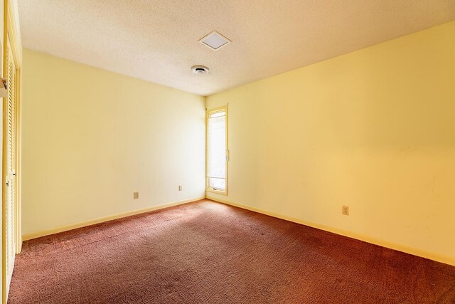 604 Augusta National Way, Knoxville, TN 37934 - unfurnished room featuring carpet and a textured ceiling