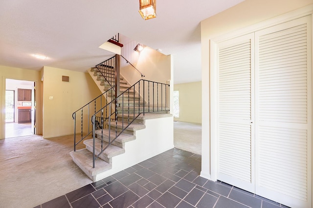 604 Augusta National Way, Knoxville, TN 37934 - stairs featuring carpet floors and baseboards