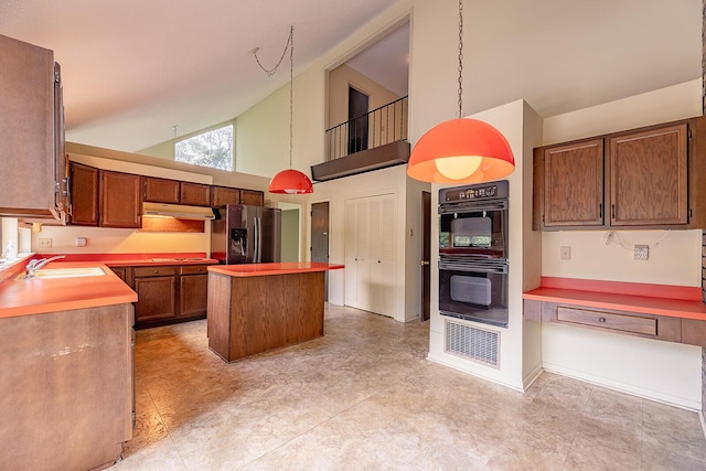 604 Augusta National Way, Knoxville, TN 37934 - kitchen featuring stainless steel refrigerator with ice dispenser, high vaulted ceiling, a center island, under cabinet range hood, and light countertops
