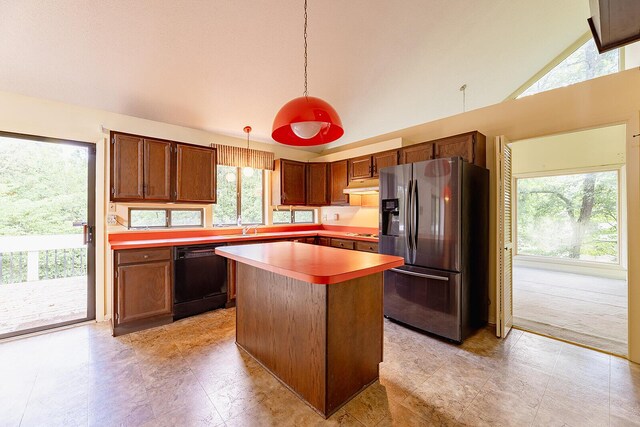 604 Augusta National Way, Knoxville, TN 37934 - kitchen featuring stainless steel fridge, black dishwasher, lofted ceiling, a kitchen island, and under cabinet range hood