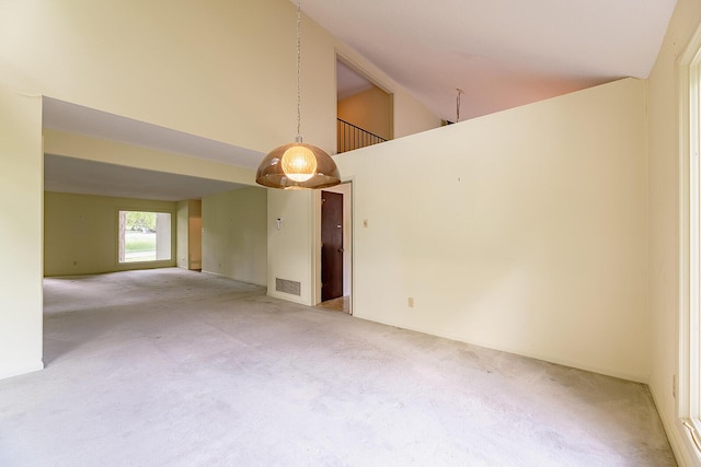 604 Augusta National Way, Knoxville, TN 37934 - carpeted empty room with high vaulted ceiling and baseboards