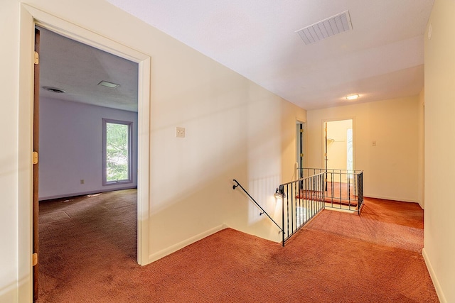 604 Augusta National Way, Knoxville, TN 37934 - corridor featuring an upstairs landing and carpet flooring
