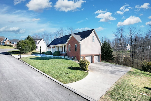 view of front facade with a garage and a front lawn