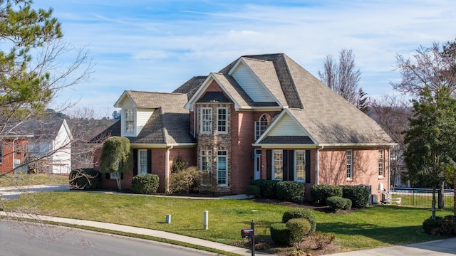 view of front of house featuring a front lawn