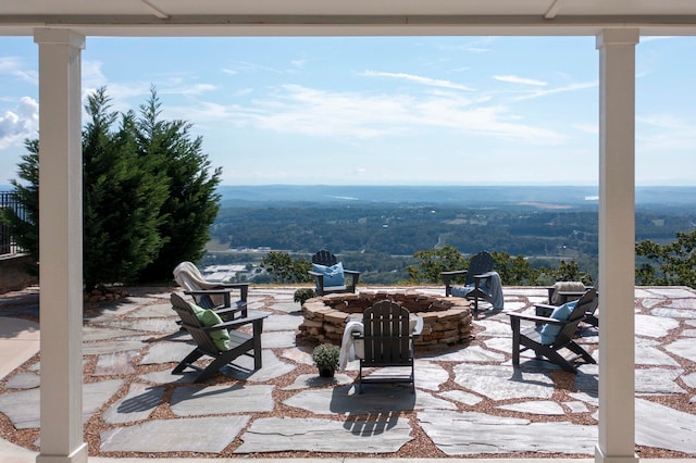 view of patio featuring an outdoor fire pit