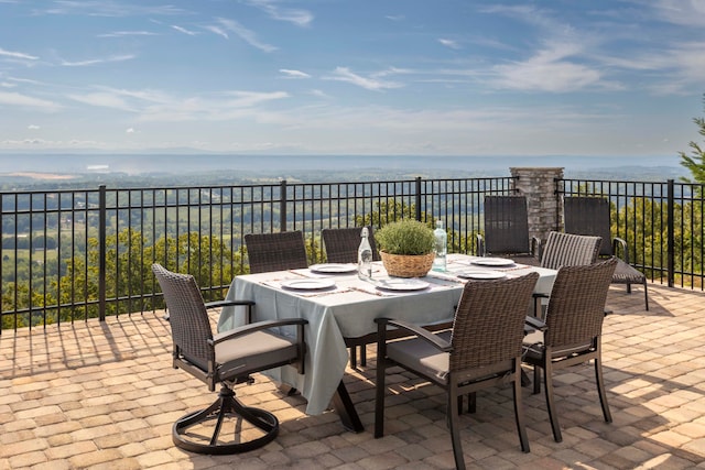 view of patio featuring a water view