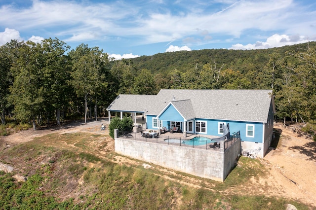 back of house featuring a patio