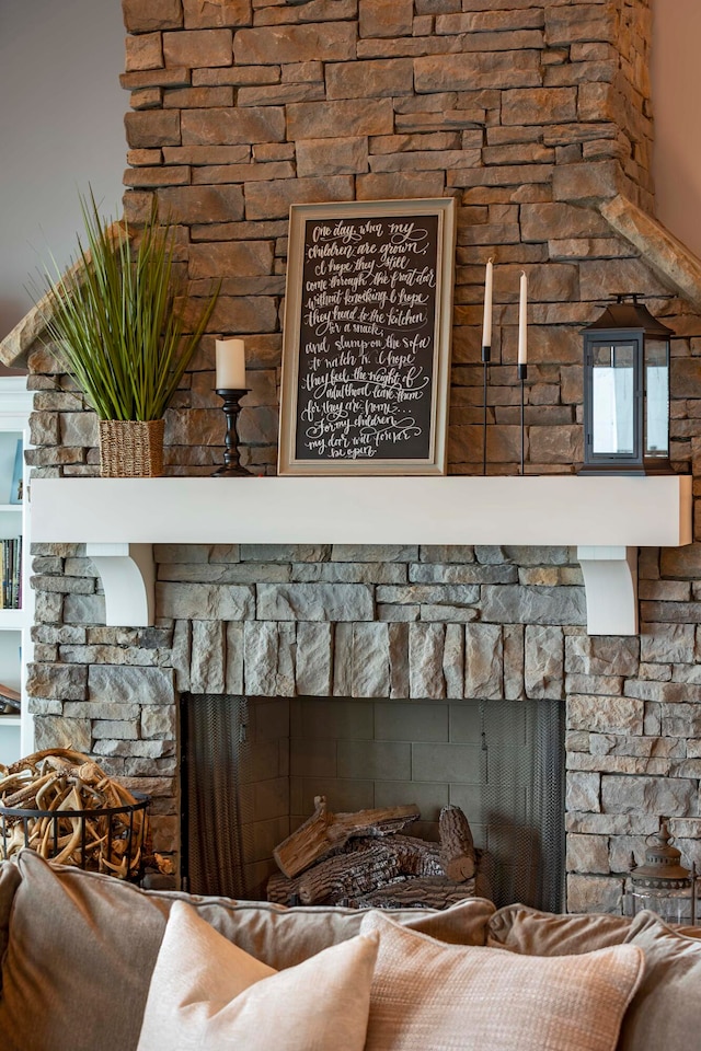 room details featuring a stone fireplace