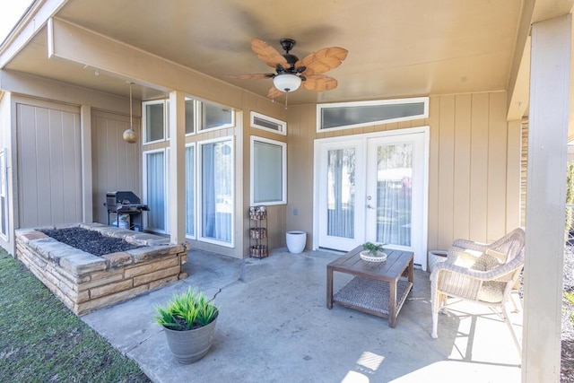 view of patio / terrace featuring ceiling fan, grilling area, and french doors