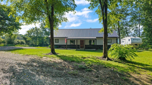 250 Creek Rd, Sweetwater, TN 37874 - view of front of house with a front yard, metal roof, and a porch