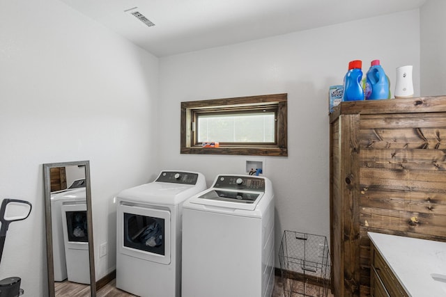 250 Creek Rd, Sweetwater, TN 37874 - laundry area with separate washer and dryer, baseboards, and wood finished floors