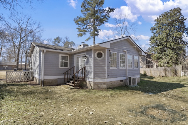 view of front facade with ac unit, a chimney, entry steps, crawl space, and fence