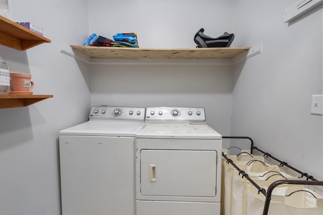 laundry room featuring laundry area and separate washer and dryer