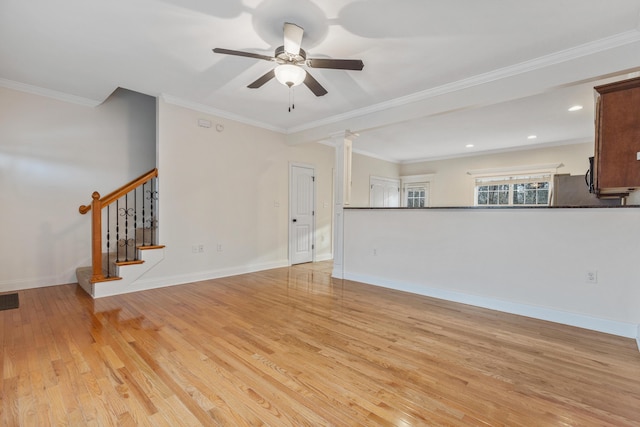 unfurnished living room featuring crown molding, ceiling fan, ornate columns, and light wood-type flooring